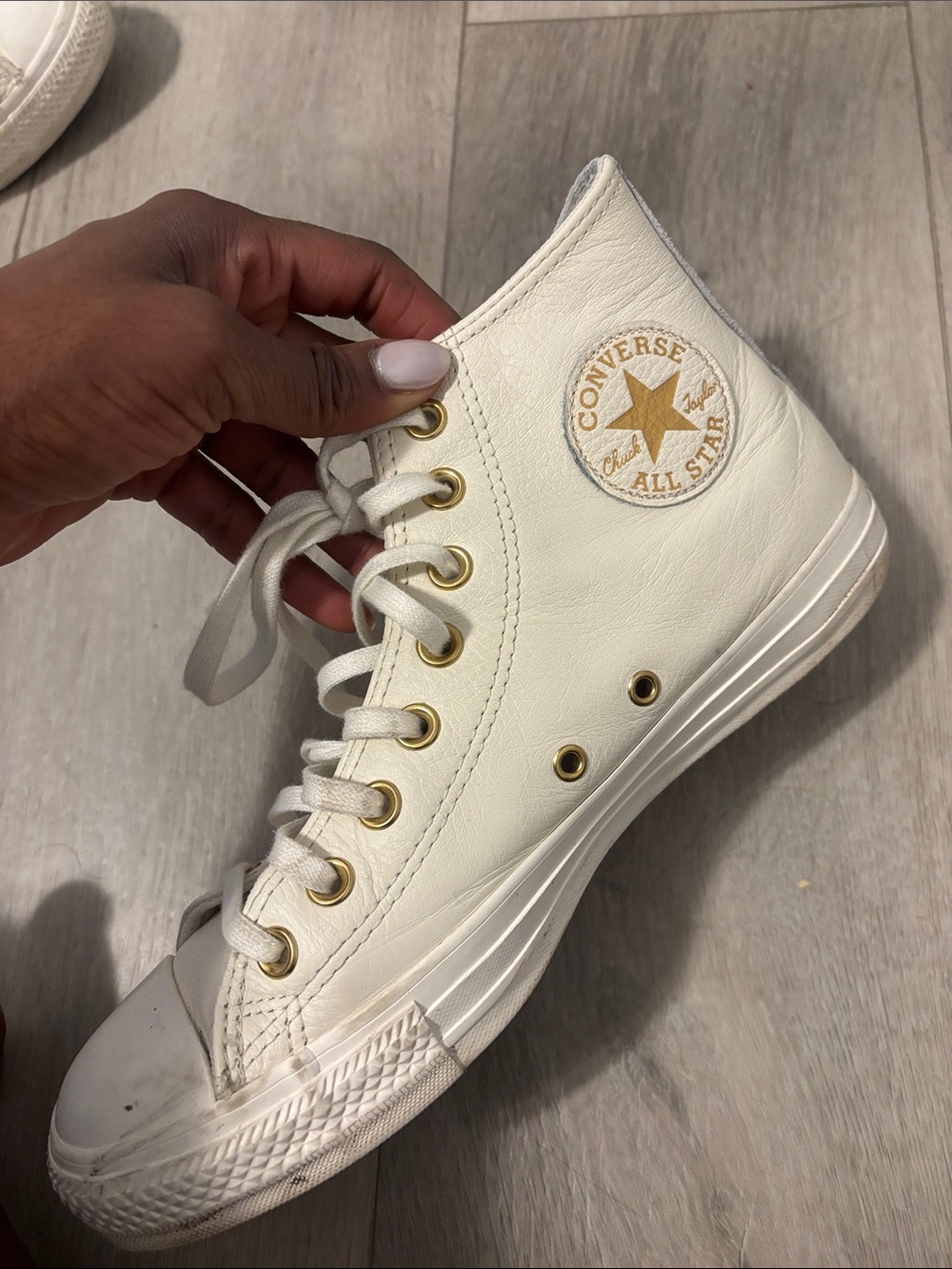 Converse Cream High-Top Sneakers with Gold Eyelets